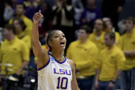 LSU forward Angel Reese (10) yells to the crowd while wearing a mouth guard with after getting a bloody lip earlier, duirng the second half of the team's second-round college basketball game against Michigan in the women's NCAA Tournament in Baton Rouge, La., Sunday, March 19, 2023. (AP Photo/Matthew Hinton)