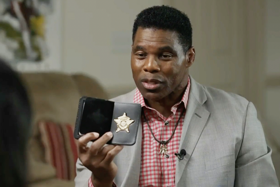 Herschel Walker spoke exclusively with NBC News’ Kristen Welker about why he flashed a police badge during a televised debate that aired Friday. (NBC )