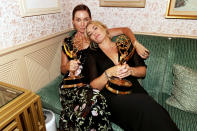 <p><em>Mare of Easttown</em>'s Julia Nicholson and Kate Winslet have a moment with their Emmy statuettes on Sept. 19 at the HBO and HBO Max Post-Emmys Reception at San Vicente Bungalows in West Hollywood.</p>