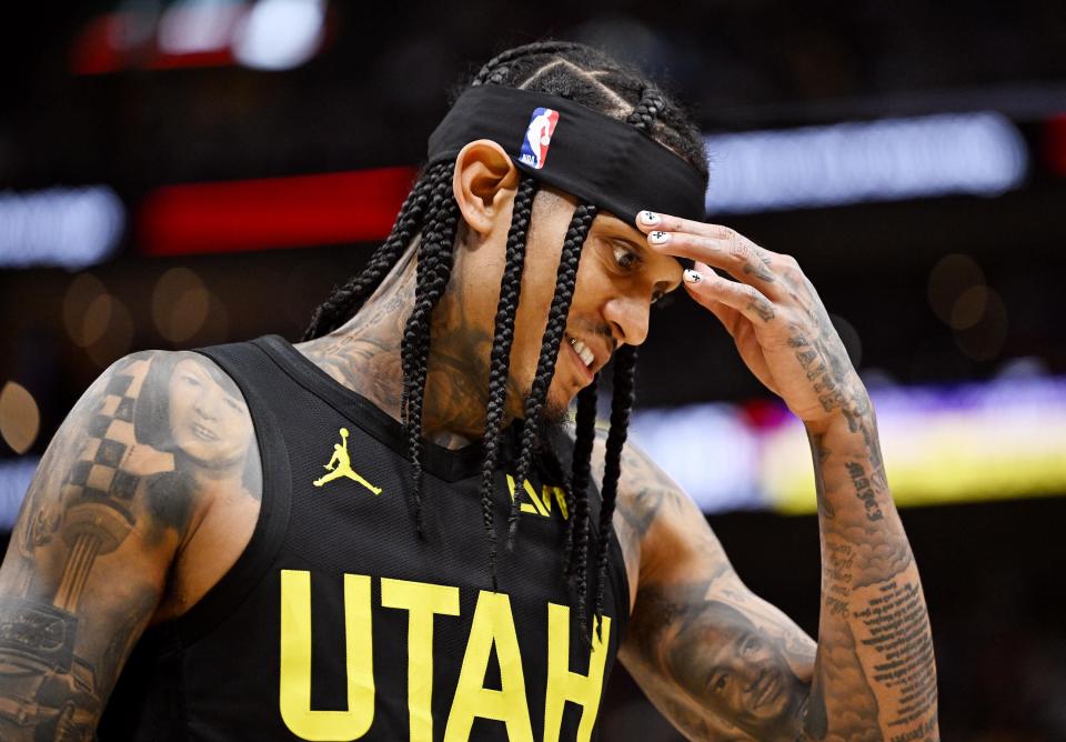 Utah Jazz guard Jordan Clarkson (00) rubs his head as the Utah Jazz and the Los Angeles Lakers play at the Delta Center in Salt Lake City on 2/14/24. LA won 138-122. | Scott G Winterton, Deseret News