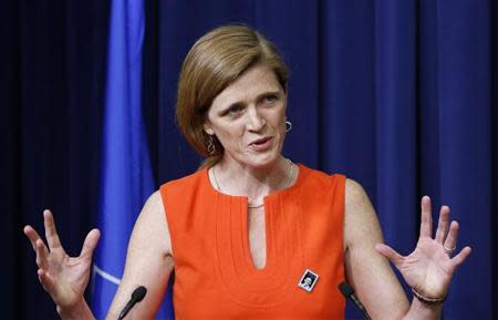U.S. Ambassador to the UN Samantha Power speaks before she helps unveiling the Harvey Milk Forever Stamp at its dedication ceremony at the White House in Washington May 22, 2014. The ceremony marks the first day of issue for the stamp honoring Milk. REUTERS/Larry Downing