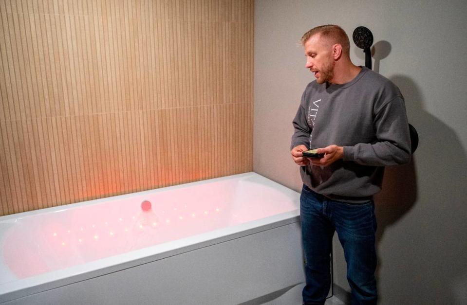 Kyle Dake talks about the Kaqun water therapy available at Vitality Wellness in State College on Wednesday, June 12, 2024. Karqun water therapy combines oxygen therapy, light therapy and heat therapy into one treatment.  