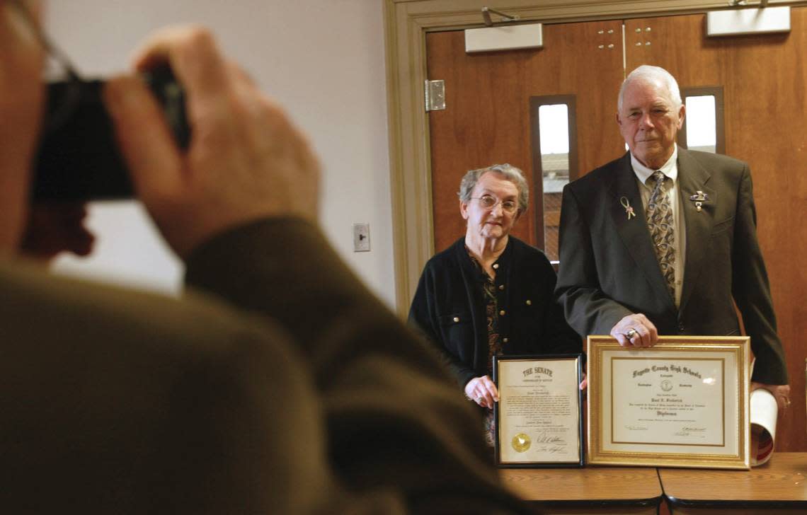 Paul N. Frederick, 78, and his wife Myrtle Frederick posed for a portrait with his new diploma while their son Larry Frederick took the photo after Paul received the first Veterans Diploma at the School Board Central Office in Lexington Ky., Apr. 21, 2003. Frederick is a WWII Vet who sacrificed graduating high school to serve his country in WWII.