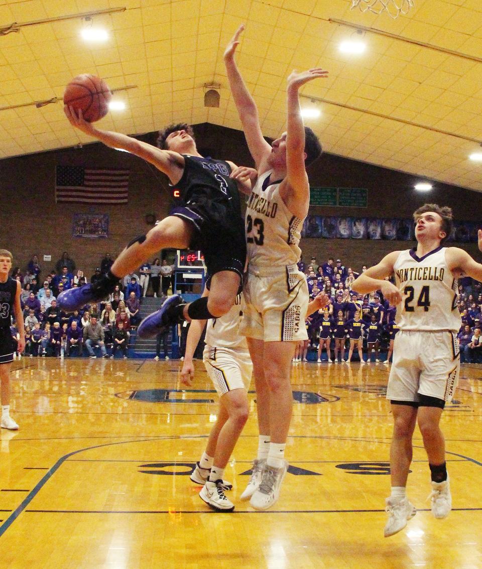 EPG's Luke Ihlenfeldt takes an off-balanced shot against Monticello's Tanner Buehnerkemper in the Clifton Sectional final Friday.