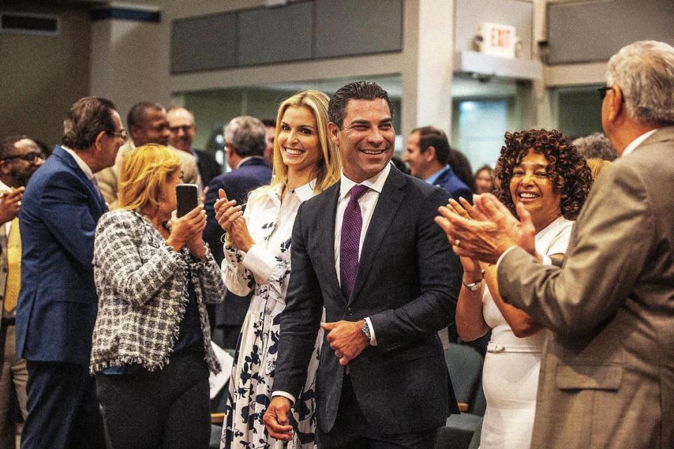 City of Miami Mayor Francis Suarez joins family members including, from left, his father former Miami Mayor Xavier Suarez, his mother Rita Suarez and his wife Gloria, along with Miami Commission Chair Christine King and Commissioner Manolo Reyes, at Miami City Hall after he delivered his State of the City address. Suarez offered his view of the city’s successes and challenges during his second and final term as mayor, on Friday, Jan. 27, 2023.