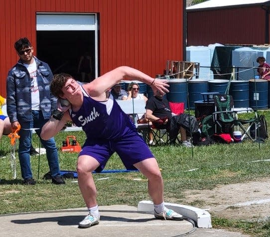 Bloomington South's David Nussbaum launches the shot put during the Edgewood Invitational on Saturday, April 23, 2022.