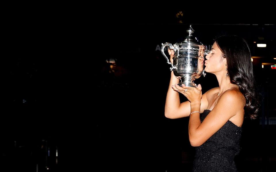 Emma Raducanu poses with the championship trophy after defeating Leylah Annie Fernandez - Sarah Stier/Getty Images