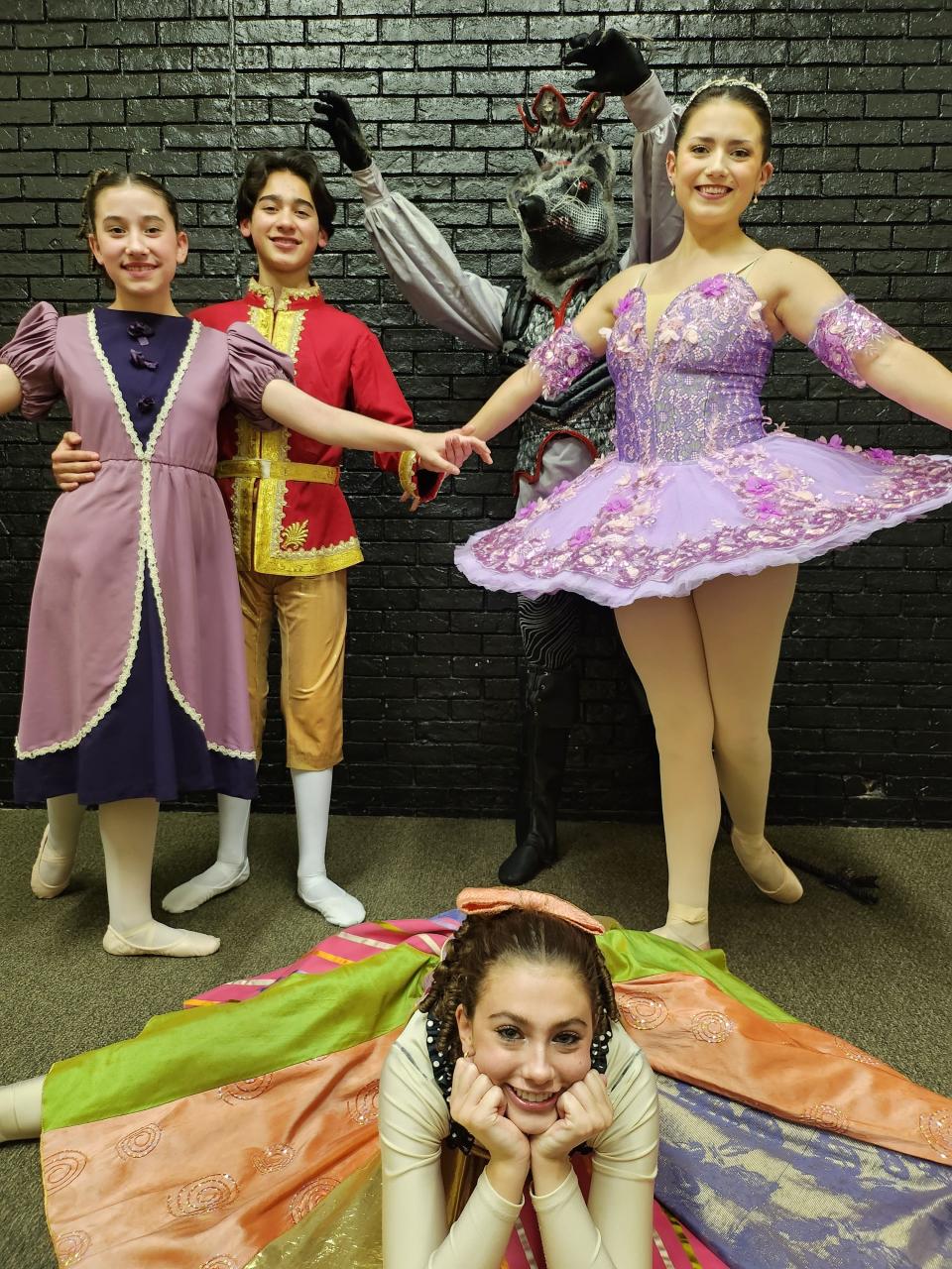 From left, Ariella Telles, portraying Clara; Jaxx Creek, portraying the Prince; Bryan Rushin, portraying the Rat King; Emily Evans, portraying the Sugar Plum Fairy; and Carmen Brown, portraying Jeune (floor) rehearse for the upcoming production of Lone Star Ballet's "The Nutcracker," to be held Dec. 8-10 at the Amarillo Civic Center Auditorium.