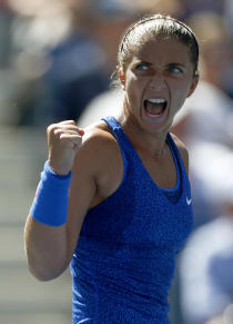 Sara Errani, of Italy, reacts after a point against Venus Williams, of the United States, during the third round of the 2014 U.S. Open tennis tournament, Friday, Aug. 29, 2014, in New York. (AP Photo/Matt Rourke)