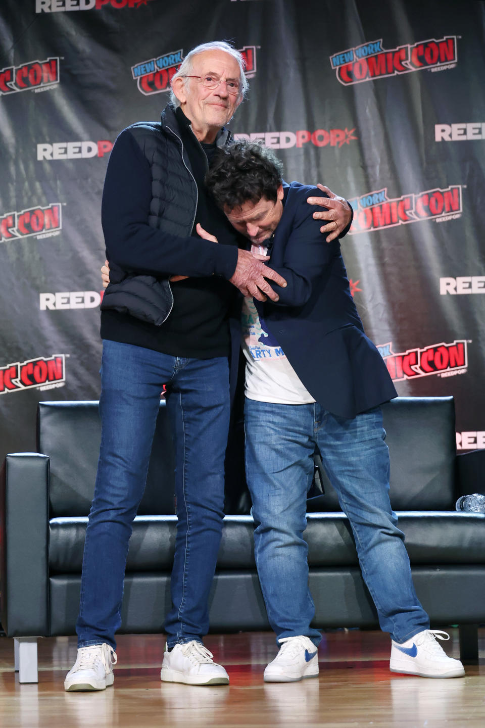 NEW YORK, NEW YORK - OCTOBER 08: Actors Christopher Lloyd (L) and Michael J. Fox attend a "Back To The Future Reunion" at New York Comic Con on October 08, 2022 in New York City. (Photo by Mike Coppola/Getty Images for ReedPop)