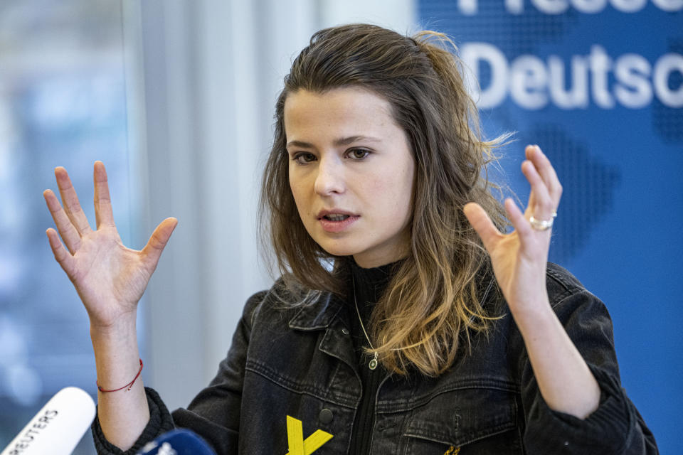 Luisa Neubauer, climate protection activist, speaks at a press briefing at the Federal Press Conference in Berlin, Germany, Monday, Jan. 16, 2023. (Fabian Sommer/dpa via AP)