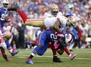 <p>San Francisco 49ers outside linebacker Ahmad Brooks (55) tackles Buffalo Bills running back LeSean McCoy (25) as he runs the ball during the first half at New Era Field. Mandatory Credit: Timothy T. Ludwig-USA TODAY Sports </p>