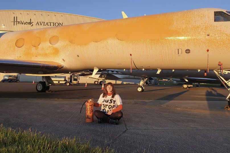 Just Stop Oil activists used fire extinguishers filled with orange paint to deface private jets on an airfield near London, England.