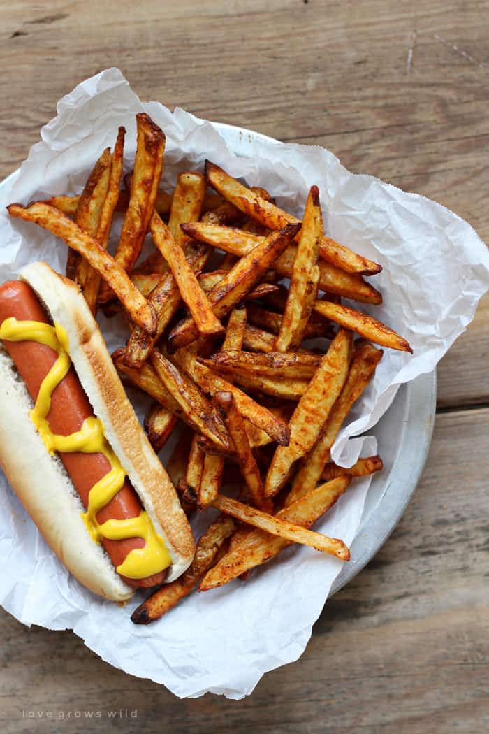 <p>Is there any better accompaniment to burgers and hot dogs than crispy French fries—especially with a host of dipping sauces?</p><p><a href="https://www.fivehearthome.com/baked-seasoned-french-fries/" rel="nofollow noopener" target="_blank" data-ylk="slk:Get the recipe." class="link ">Get the recipe. </a></p>