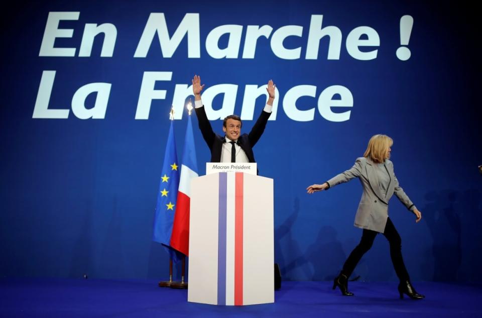 <div class="inline-image__caption"><p>Emmanuel Macron, head of the political movement En Marche!, or Onwards!, and candidate for the 2017 French presidential election, gestures to supporters after the first round of 2017 French presidential election in Paris, France, April 23, 2017.</p></div> <div class="inline-image__credit">Benoit Tessier/Reuters</div>