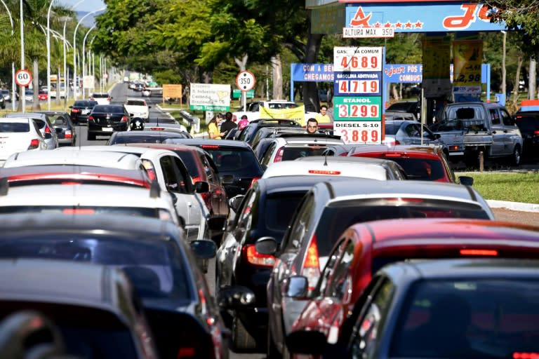 Long lines formed at service stations where supplies were running out