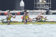 Lucy Stephan, Rosemary Popa, Jessica Morrison and Annabelle McIntyre of Australia celebrate after winning the gold medals in the women's rowing four final at the 2020 Summer Olympics, Wednesday, July 28, 2021, in Tokyo, Japan. (AP Photo/Lee Jin-man)