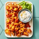 <p>Rice flour and cornstarch make these bites extra crispy! Plus, they are tossed in a crowd-pleasing condiment, buffalo sauce!</p><p>Get the <strong><a href="https://www.goodhousekeeping.com/food-recipes/a42297258/buffalo-cauliflower-bites-recipe/" rel="nofollow noopener" target="_blank" data-ylk="slk:Buffalo Cauliflower Bites recipe;elm:context_link;itc:0;sec:content-canvas" class="link ">Buffalo Cauliflower Bites recipe</a></strong>.</p>