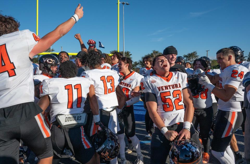 Ventura College's Gabe Rivera (52) and his teammates celebrate after beating the Pirates beat Fullerton College 27-24 in the Southern California semifinals on Saturday, Nov. 25, 2023, at Fullerton.