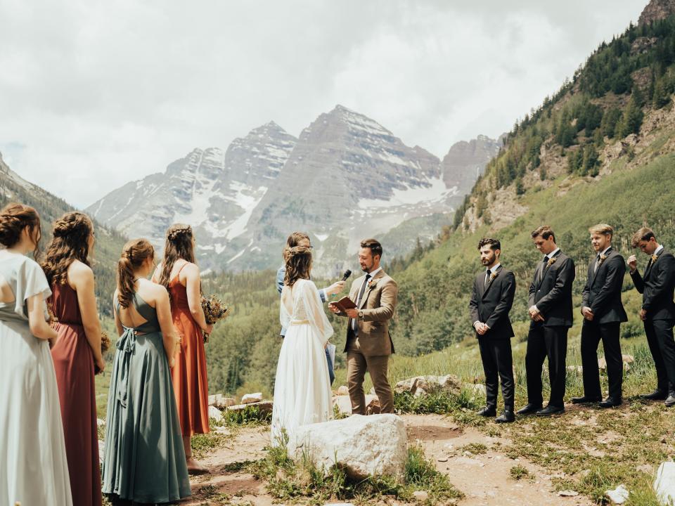 abi getting married to her husband at maroon bells amphitheater