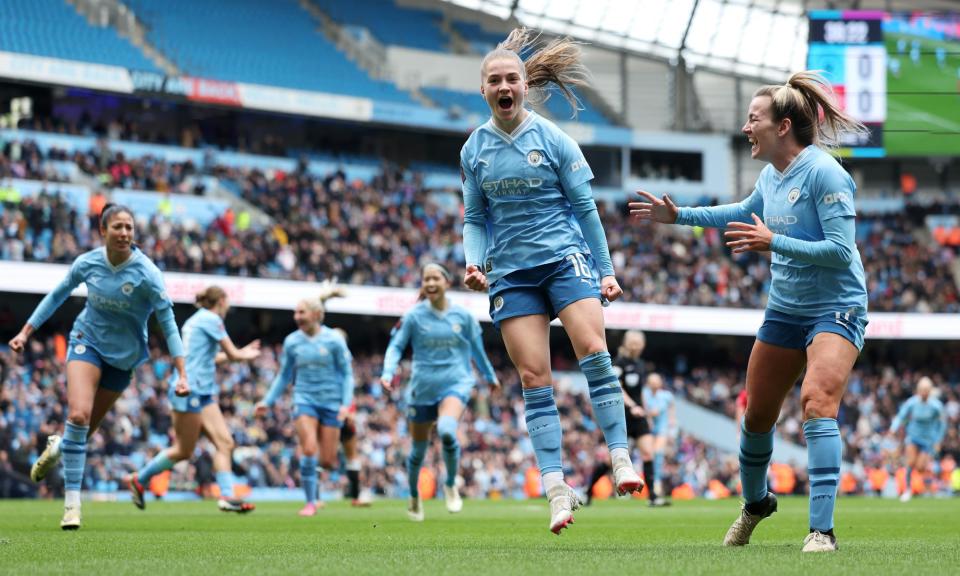 <span>Jess Park jumps for joy after giving <a class="link " href="https://sports.yahoo.com/soccer/teams/manchester-city/" data-i13n="sec:content-canvas;subsec:anchor_text;elm:context_link" data-ylk="slk:Manchester City;sec:content-canvas;subsec:anchor_text;elm:context_link;itc:0">Manchester City</a> the lead against Manchester United.</span><span>Photograph: Matt McNulty/The FA/Getty Images</span>