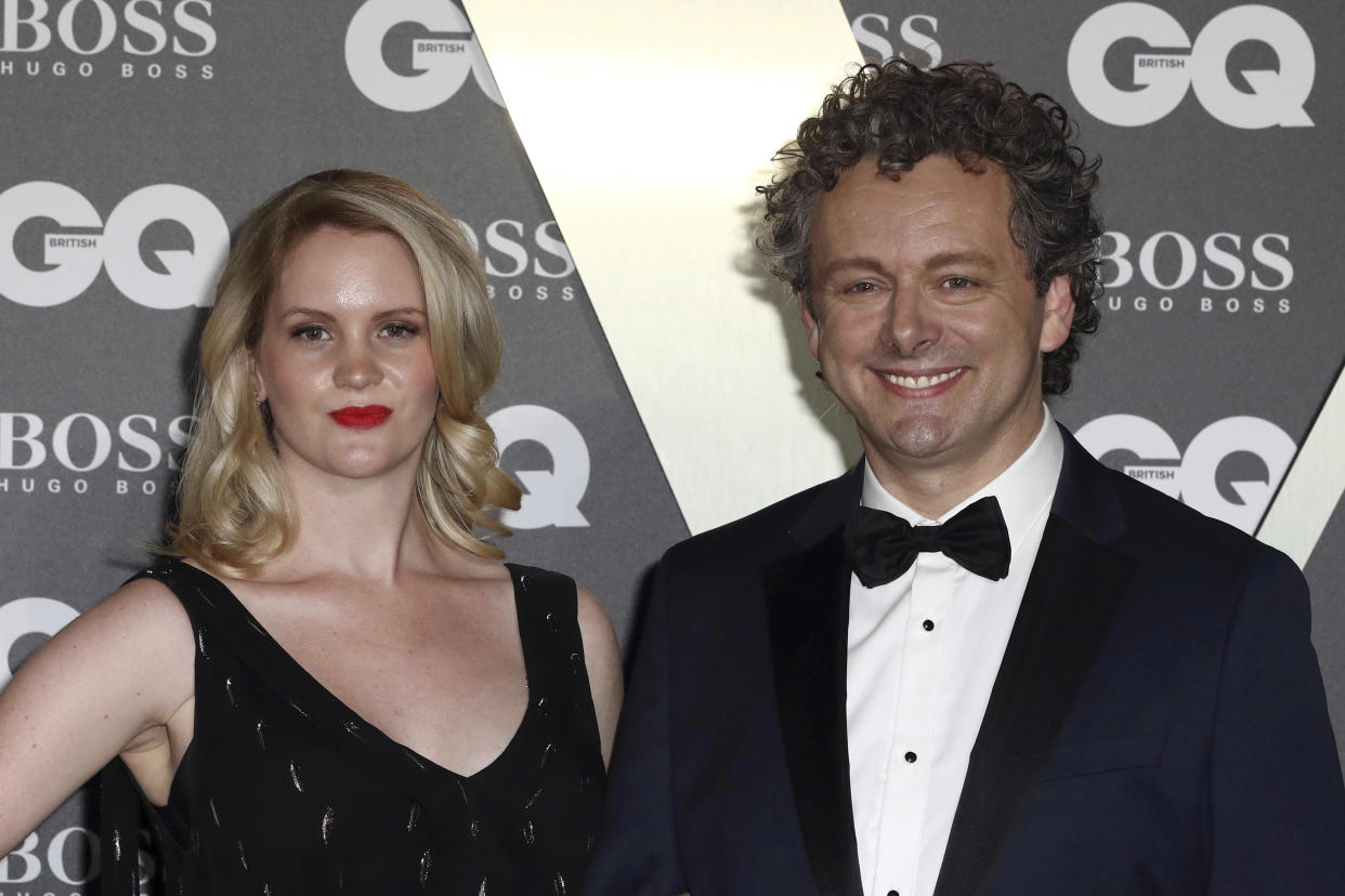 Actor Michael Sheen and partner Anna Lundberg pose for photographers on arrival at the GQ Men of the year Awards in central London on Tuesday, Sept. 3, 2019. (Photo by Grant Pollard/Invision/AP)