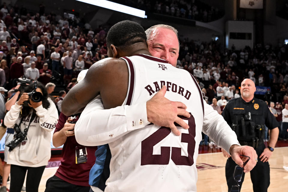Mar 4, 2023; College Station, Texas; Texas A&M Aggies head coach Buzz Williams and guard Tyrece Radford (23) embrace after the win against the Alabama Crimson Tide at Reed Arena. Maria Lysaker-USA TODAY Sports