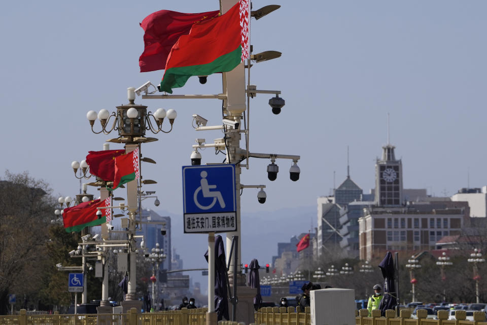 Belarusian flags are flown near the Chinese flag on Tiananmen Square in Beijing, Wednesday, March 1, 2023. Belarusian President Alexander Lukashenko, a close ally of Russian leader Vladimir Putin, has arrived in Beijing on a three-day state visit. (AP Photo/Ng Han Guan)