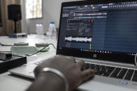 A student composes a music at a beat making class for women in Dakar, Senegal, Wednesday, Aug. 14, 2024. (AP Photo/Annika Hammerschlag)