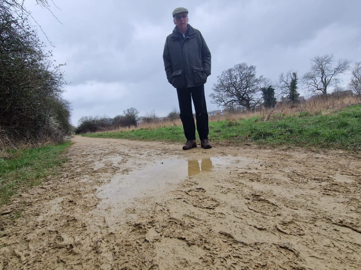 Parish council chairman Steve Brooker on the Whittington path in Worcestershire. (SWNS)