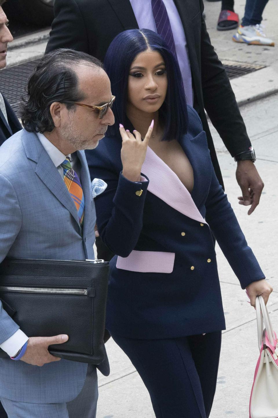 Grammy-winning rapper Cardi B arrives for a hearing at Queens County Criminal Court, Tuesday, June 25, 2019, in New York. (AP Photo/Mary Altaffer)