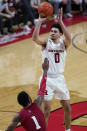 Rutgers guard Geo Baker (0) shoots over Indiana guard Al Durham (1) during the second half of an NCAA college basketball game Wednesday, Feb. 24, 2021, in Piscataway, N.J. (AP Photo/Kathy Willens)