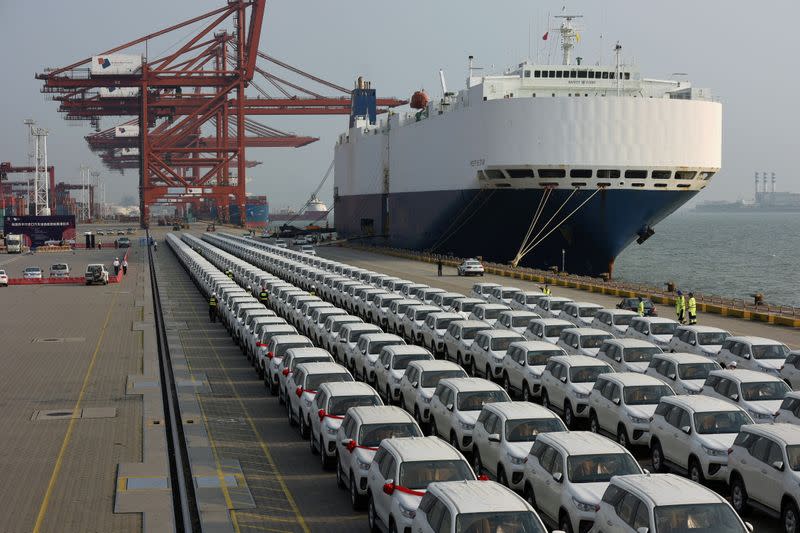FILE PHOTO: Imported Toyota cars arrive from a cargo vessel at the Shenzhen Dachan Bay Terminals in Guangdong