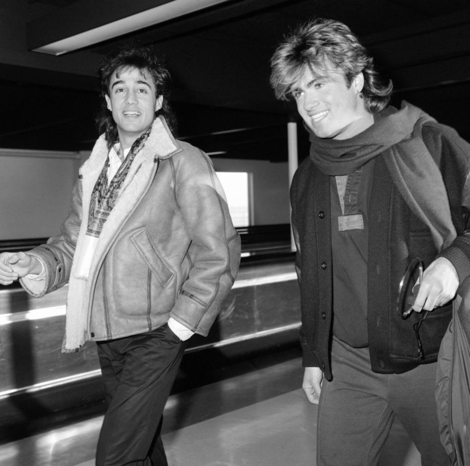 George Michael (r) and Andrew Ridgeley of Wham at Heathrow Airport before leaving for a tour of Japan.