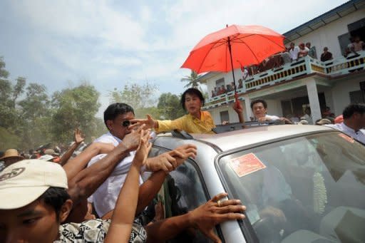 Myanmar opposition leader Aung San Suu Kyi greets supporters in Kawhmu. The April 1 by-elections saw Suu Kyi, the Nobel Peace Prize-winning democracy activist who had spent most of the past two decades under house arrest, win a seat in the military-dominated parliament