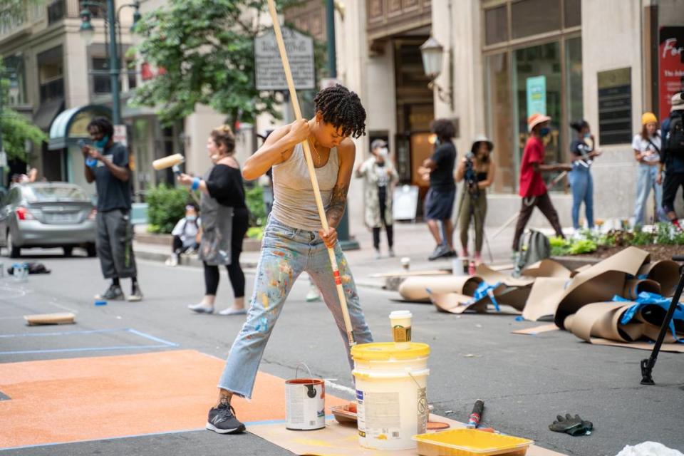 On June 9, Dakotah Aiyanna was uptown painting Black Lives Matter along Tryon Street with other artists in Charlotte.