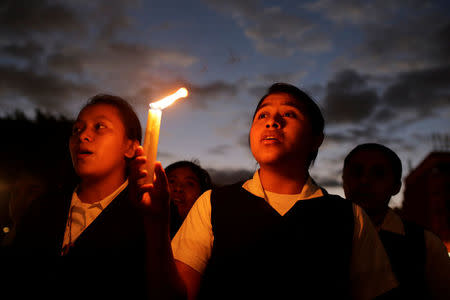 A vigil for victims after a fire broke out at the Virgen de Asuncion home in San Jose Pinula, on the outskirts of Guatemala City, March 9, 2017. REUTERS/Saul Martinez
