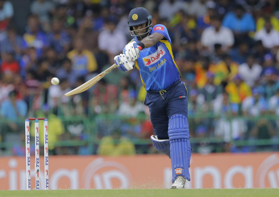 Sri Lanka's Angelo Mathews plays a shot during the third one-day international cricket match between Sri Lanka and Bangladesh in Colombo, Sri Lanka, Wednesday, July 31, 2019. (AP Photo/Eranga Jayawardena)