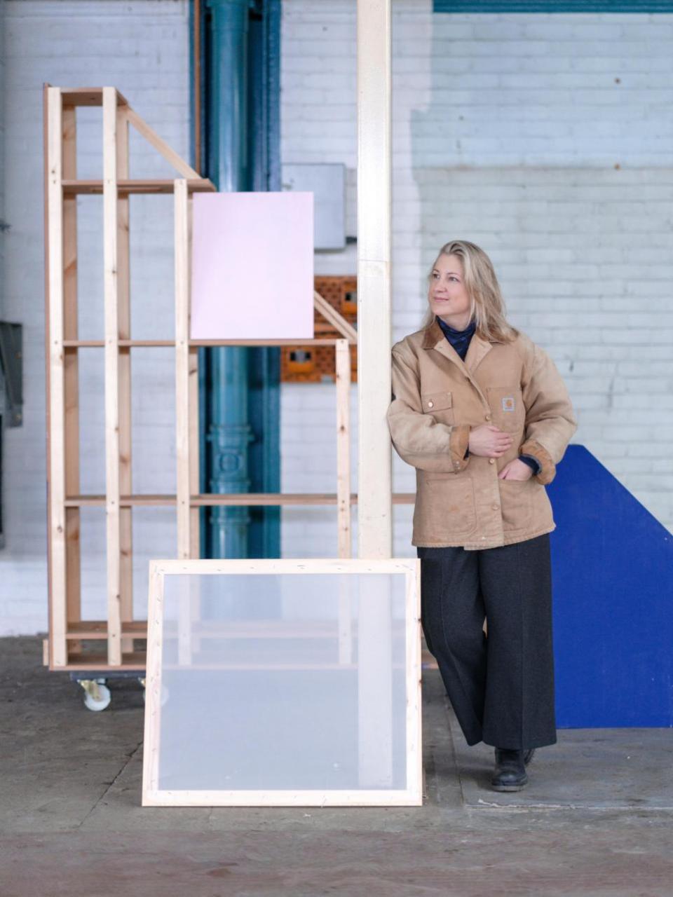 The National: Dr Stacey Hunter, Creative Director Dundee Design Festival with some of the exhibition materials donated by V&A Dundee photo by Grant Anderson
