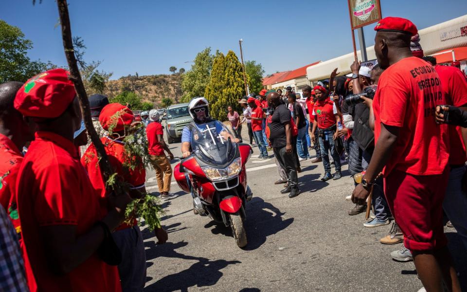 Economic Freedom Front (EFF) supporters during the bail application for two men accused of murdering young farm manager Brendin Horner - Shutterstock