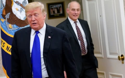 U.S. President Donald Trump arrives with White House Chief of Staff John Kelly - Credit: Reuters