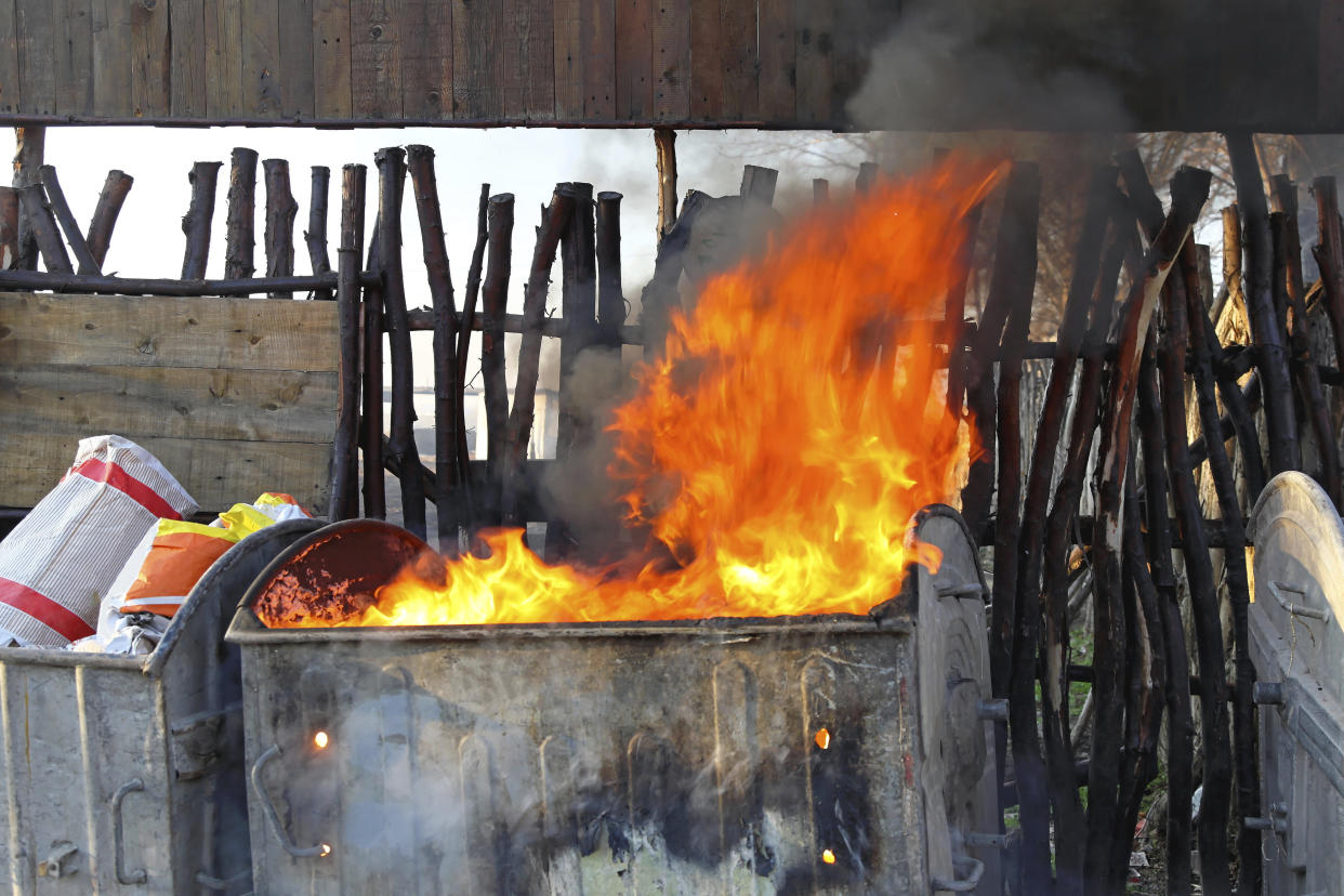 The original meaning of "dumpster fire." (Photo: Baloncici via Getty Images)