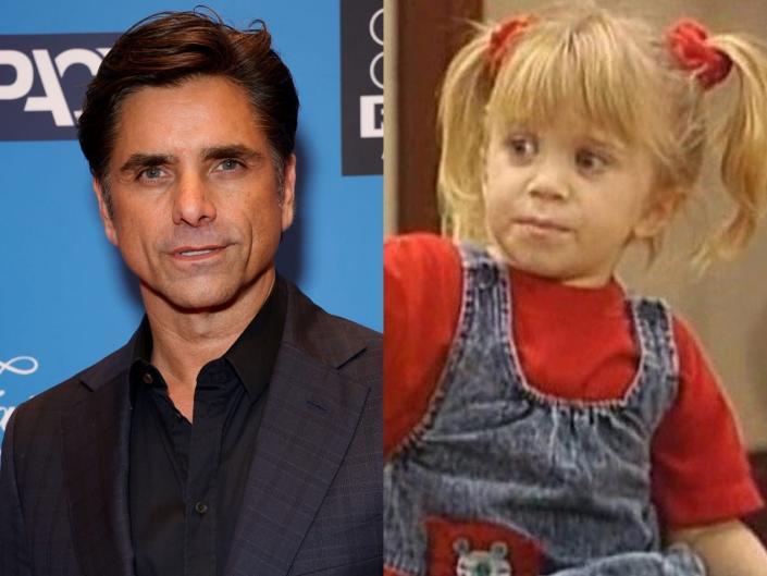 John Stamos and Michelle Tanner played by Mary-Kate and Ashley Olsen in "Full House."
