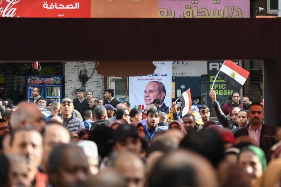 PHOTO: Egyptians arrive at a polling station to cast their ballots in the presidential election in Cairo at the Technical Institute in Boulaq district on Dec. 10, 2023. (Ahmed Hasan/AFP via Getty Images)