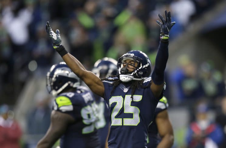 Richard Sherman supported a high school honors student's college aims. (AP_