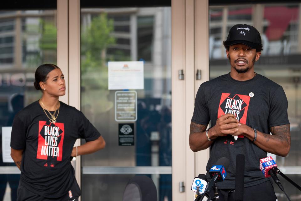 Washington Wizard NBA player Bradley Beal (right) and Washington Mystics WNBA player Natasha Cloud speak prior to a Juneteenth rally in Washington, D.C. (Jim Watson/AFP via Getty Images)