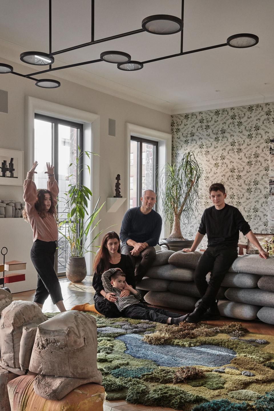 The family, lounging in the living room.