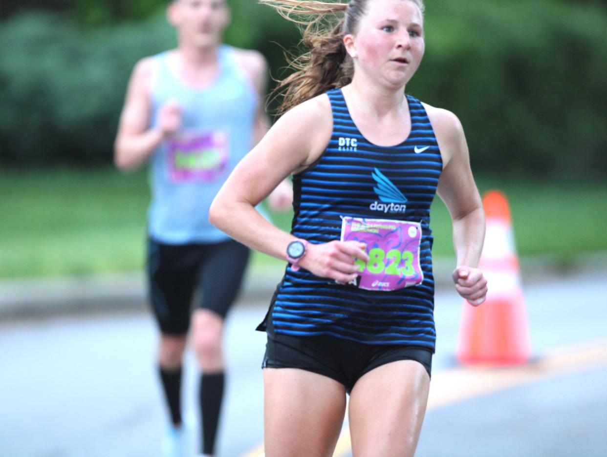Women's marathon winner Olivia Anger races in Mariemont around 16-mile mark during the Flying Pig Marathon, May 5, 2024.