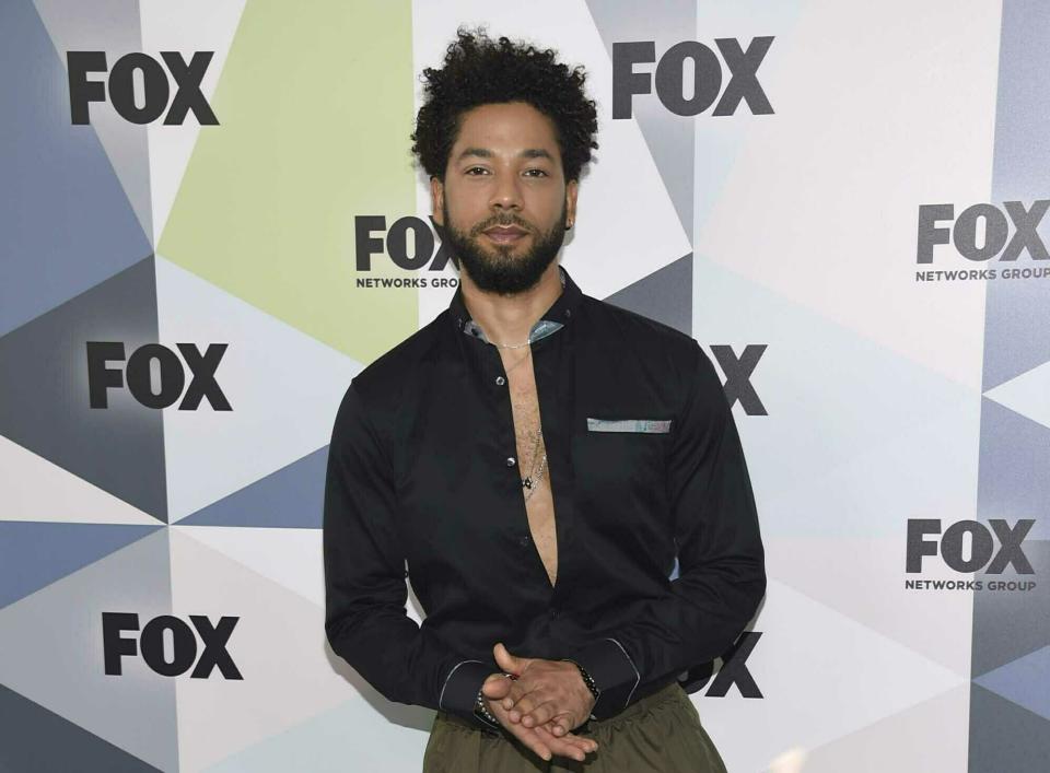 FILE - In this May 14, 2018 file photo, Jussie Smollett, a cast member in the TV series "Empire," attends the Fox Networks Group 2018 programming presentation afterparty in New York. A police official says "Empire" actor is now considered a suspect "for filing a false police report" and that detectives are presenting the case against him to a grand jury. Smollett told police he was attacked by two masked men while walking home from a Subway sandwich shop at around 2 a.m. on Jan. 29. He says they beat him, hurled racist and homophobic insults at him and looped a rope around his neck before fleeing. (Photo by Evan Agostini/Invision/AP, File)