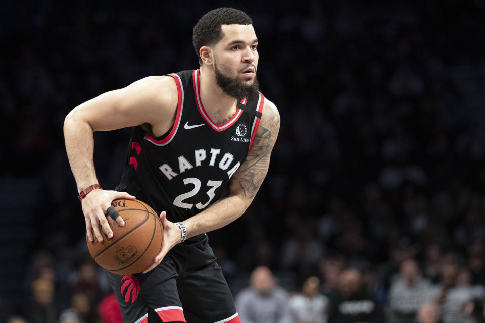 FILE - In this Jan. 4, 2020, file photo, Toronto Raptors guard Fred VanVleet looks to pass the ball during the first half of an NBA basketball game against the Brooklyn Nets in New York. VanVleet agreed Saturday, Nov. 21, 2020, to a four-year, $85 million contract to remain with the Toronto Raptors, a person with direct knowledge of the discussions told The Associated Press on condition of anonymity because the contract remains unsigned. (AP Photo/Mary Altaffer, File)